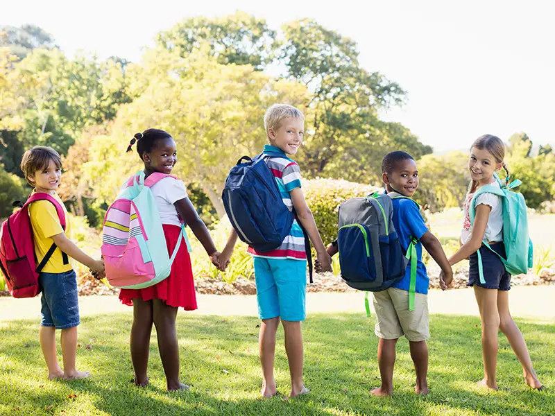 Kids wearing backpacks
